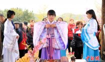 “花朝节”江西民众踏青赏花 汉服少女拜花神