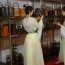 汉服美女手拿竹制工艺品